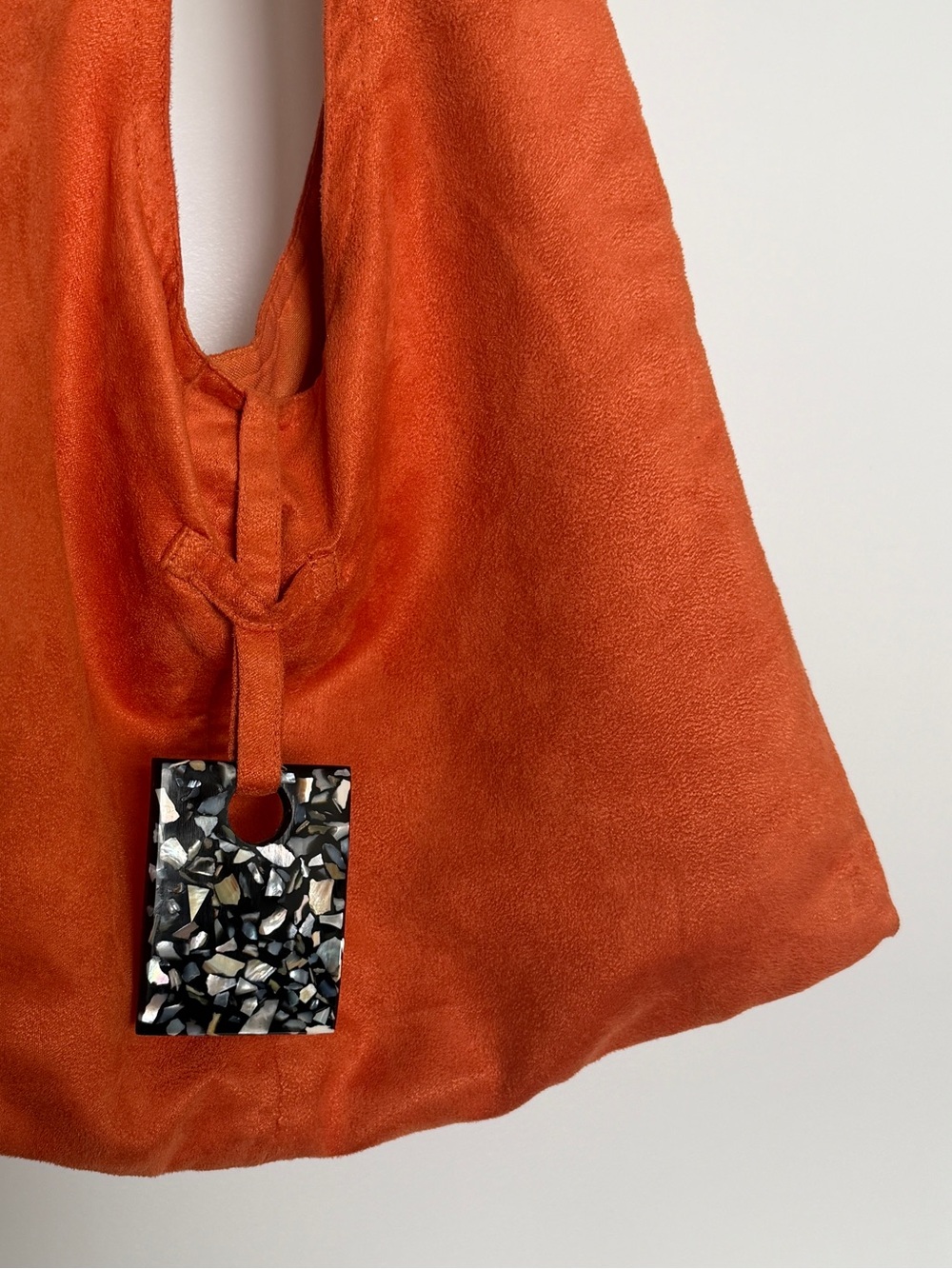 Suede Shoulder Hobo in Rich Orange with Terrazzo Pendant